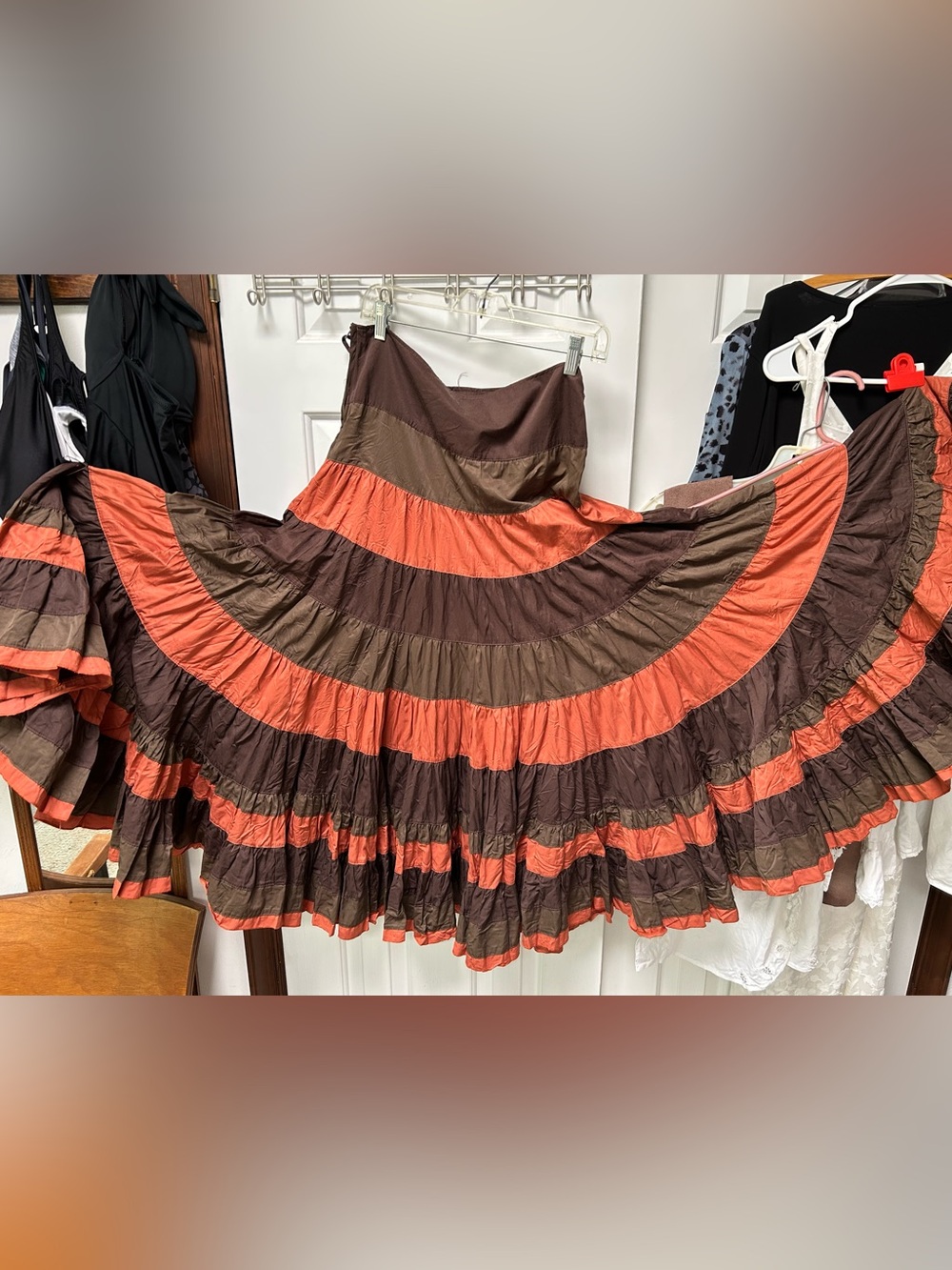 11 Tiered Maxi Skirt in Brown/Coral/dk Green. Side zipper. Tabs for skinny belt.